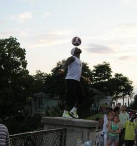 A very clever young man on a plinth by the Sacré Coeur